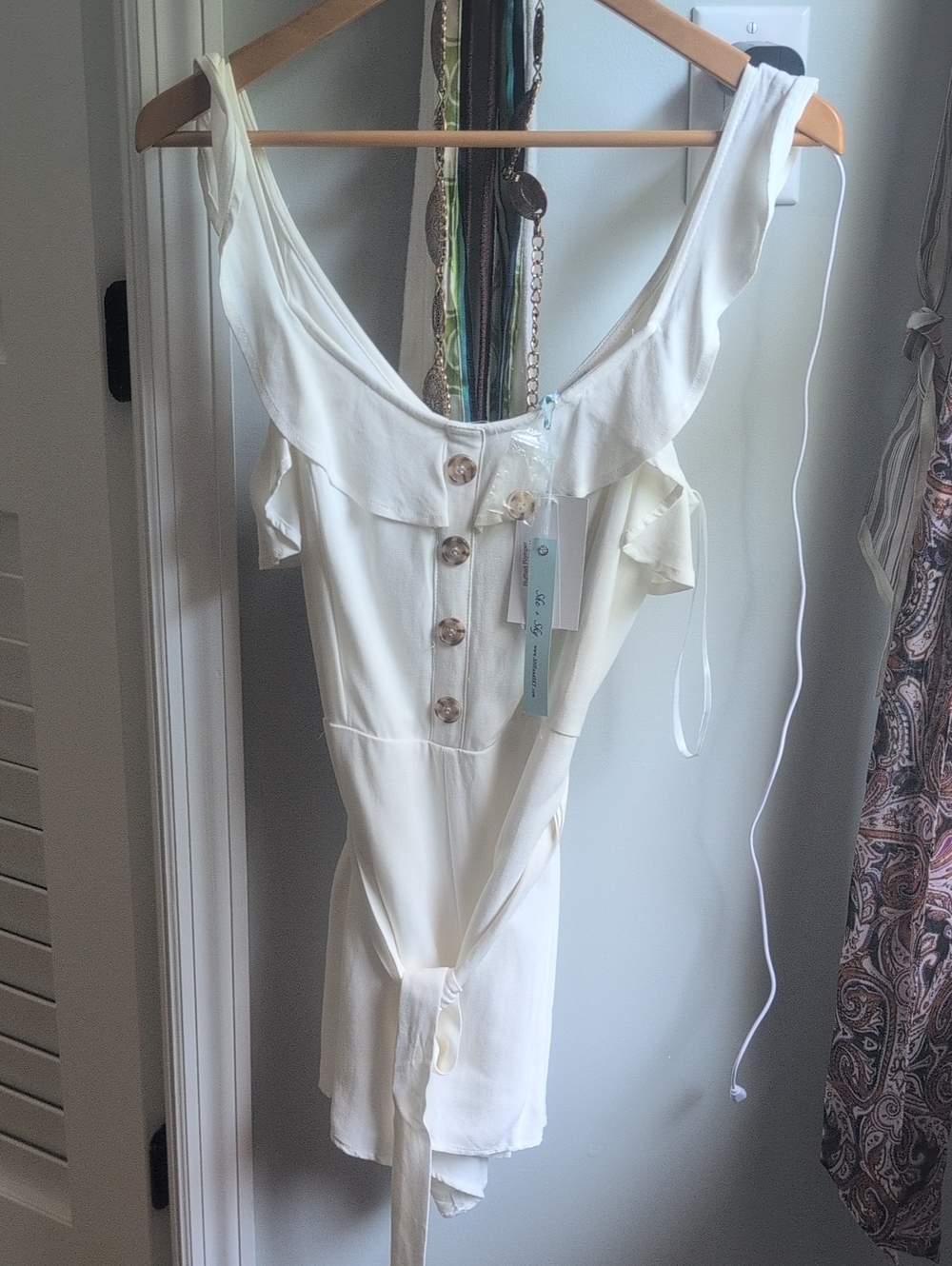 NWT! She + Sky Ivory Ruffled Romper with Contrast Buttons And Zipped Back